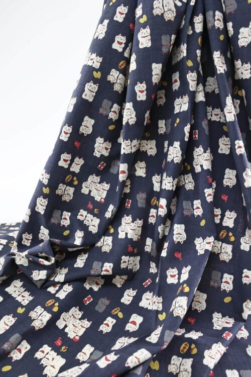 Japanese Maneki Neko dobby cotton fabric – blue background