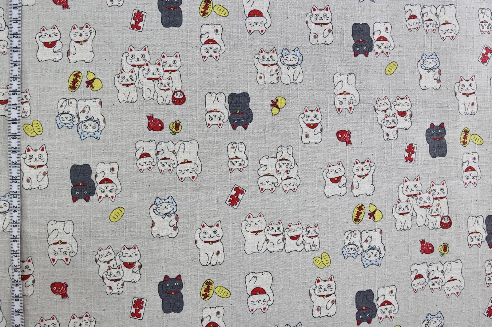 Japanese Maneki Neko dobby cotton fabric – ecru background