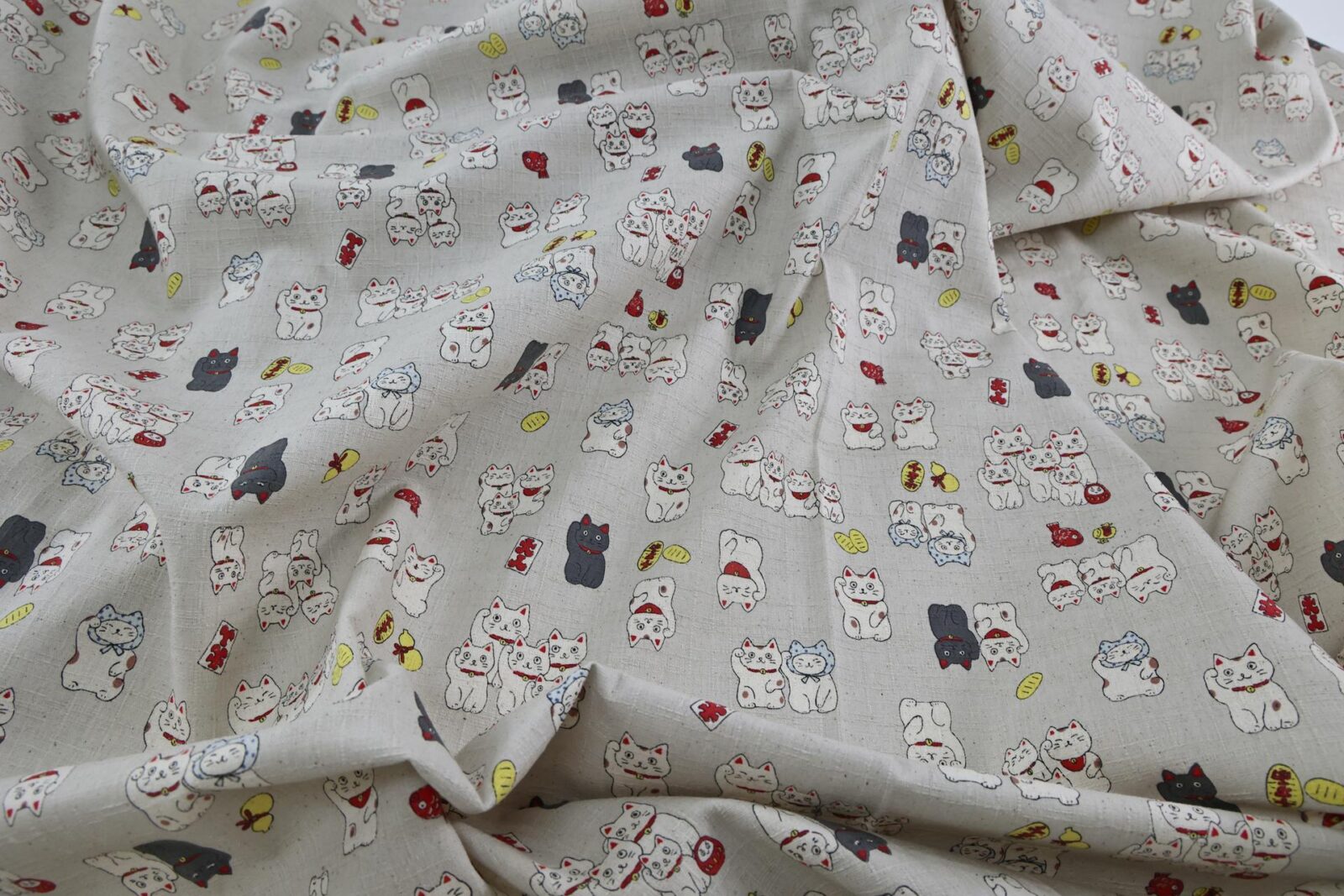 Japanese Maneki Neko dobby cotton fabric – ecru background