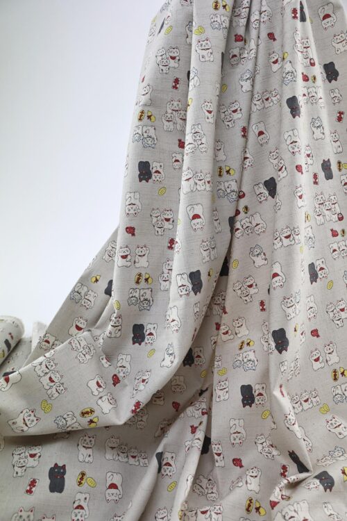 Japanese Maneki Neko dobby cotton fabric – ecru background