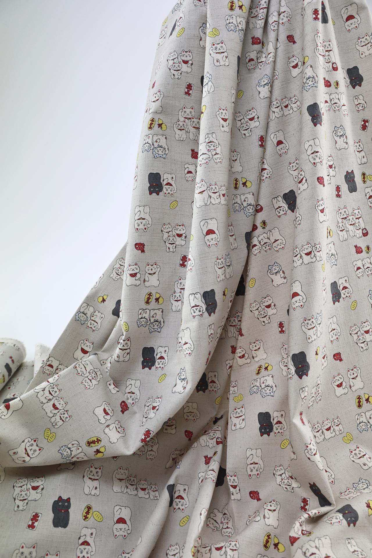 Japanese Maneki Neko dobby cotton fabric – ecru background