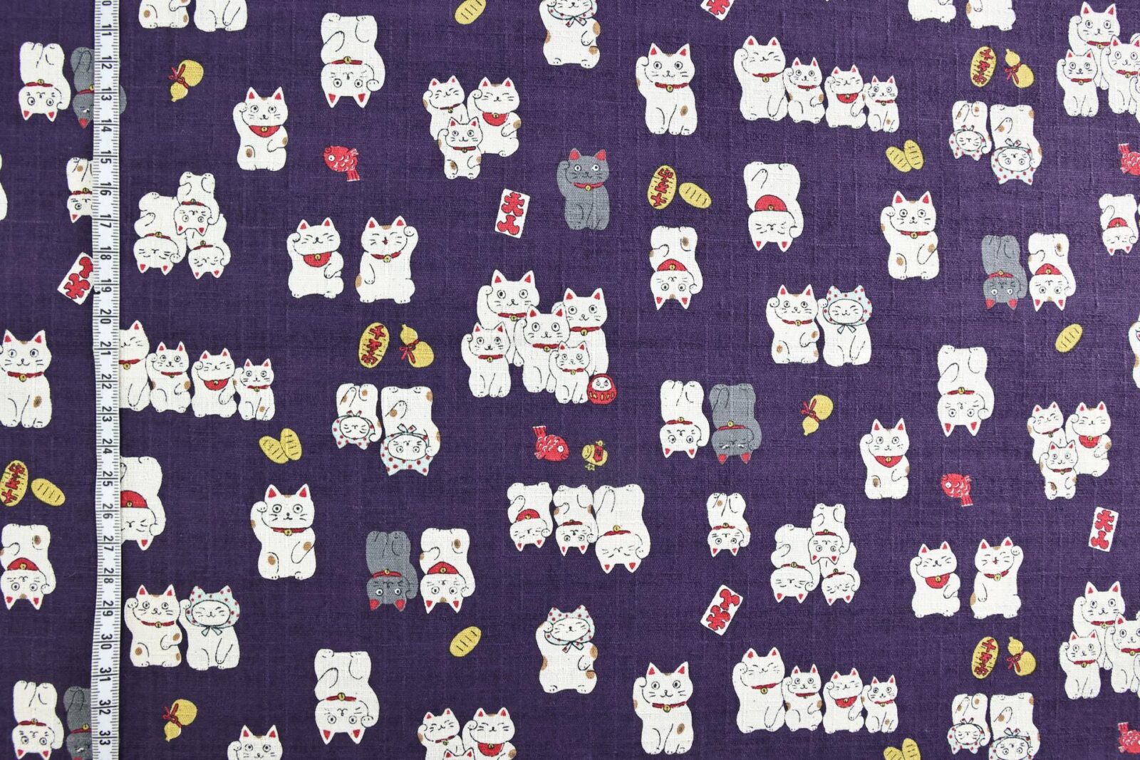 Japanese Maneki Neko dobby cotton fabric – purple background