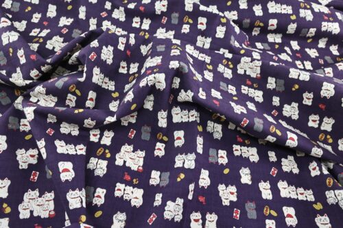 Japanese Maneki Neko dobby cotton fabric – purple background