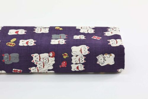 Japanese Maneki Neko dobby cotton fabric – purple background
