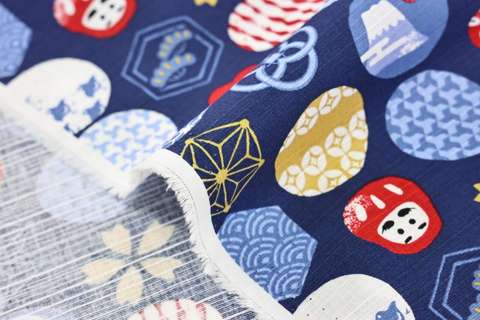 Japanese fabric colorful symbols blue background