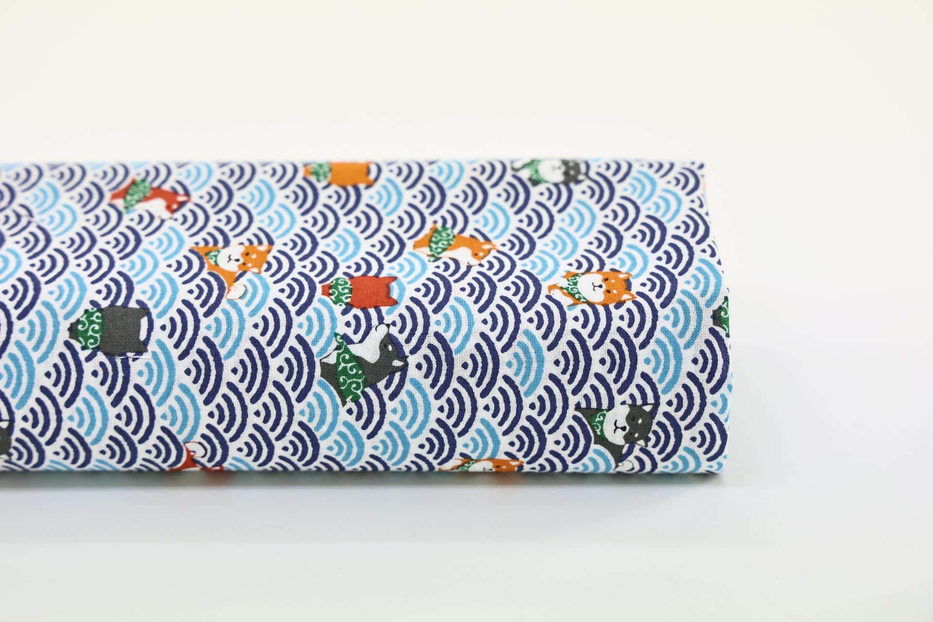 Kawaii Shiba fabric with blue seigaiha waves