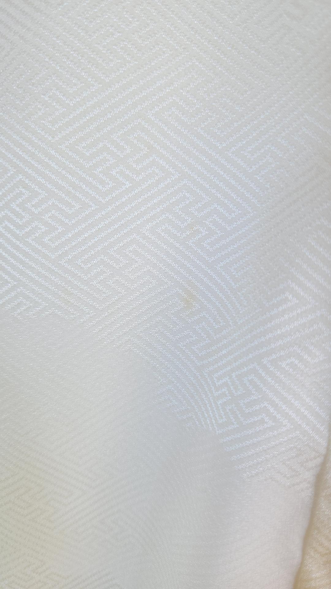 Nagajuban in green yellow Sayagata-patterned brocade