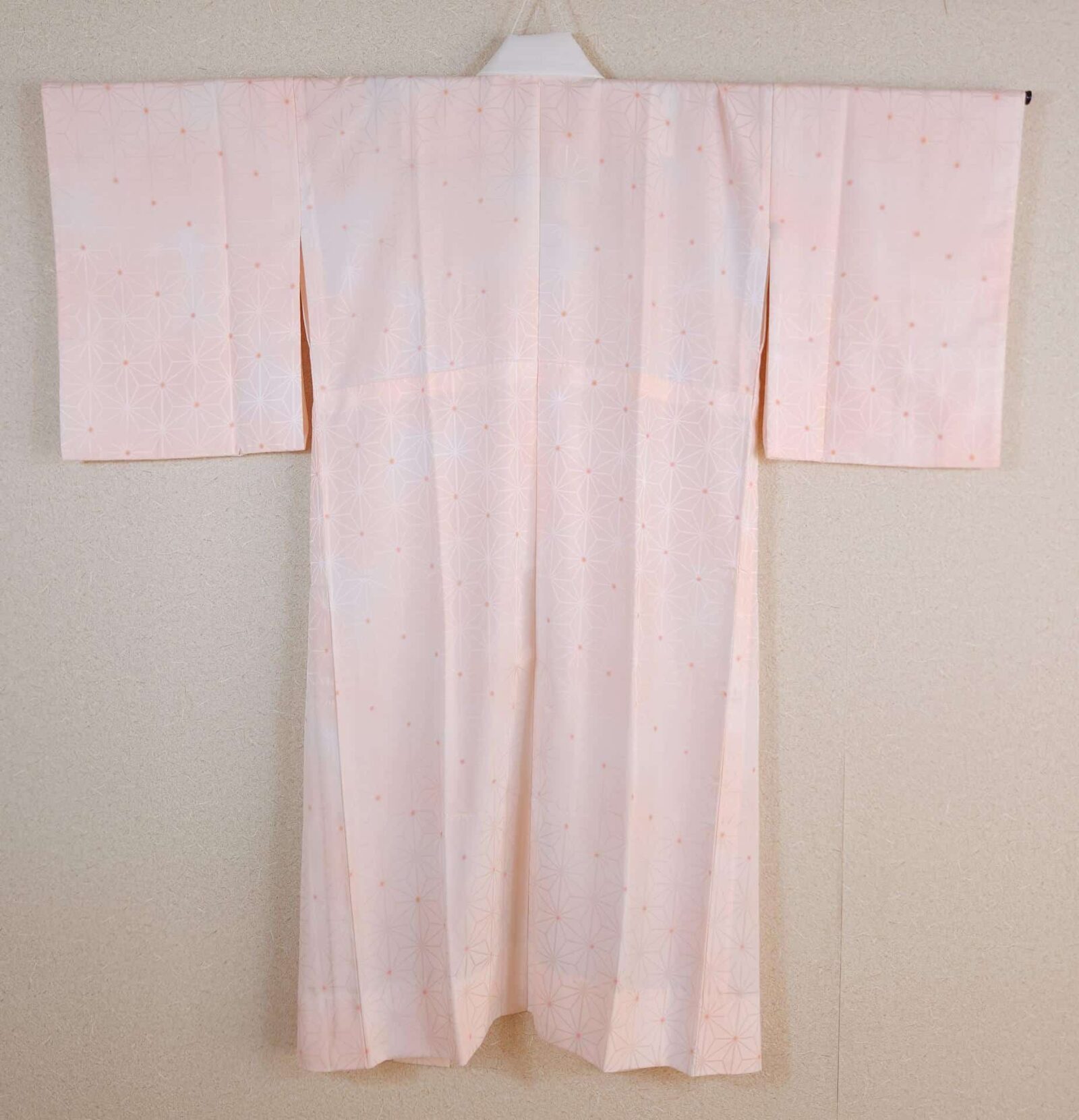 Nagajuban in salmon pink Asanoha-patterned brocade
