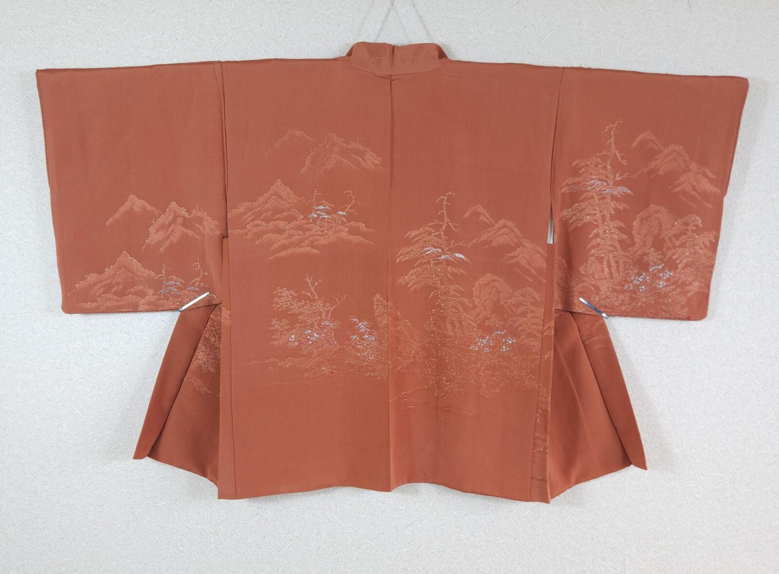 Orange Haori with silver landscape motifs