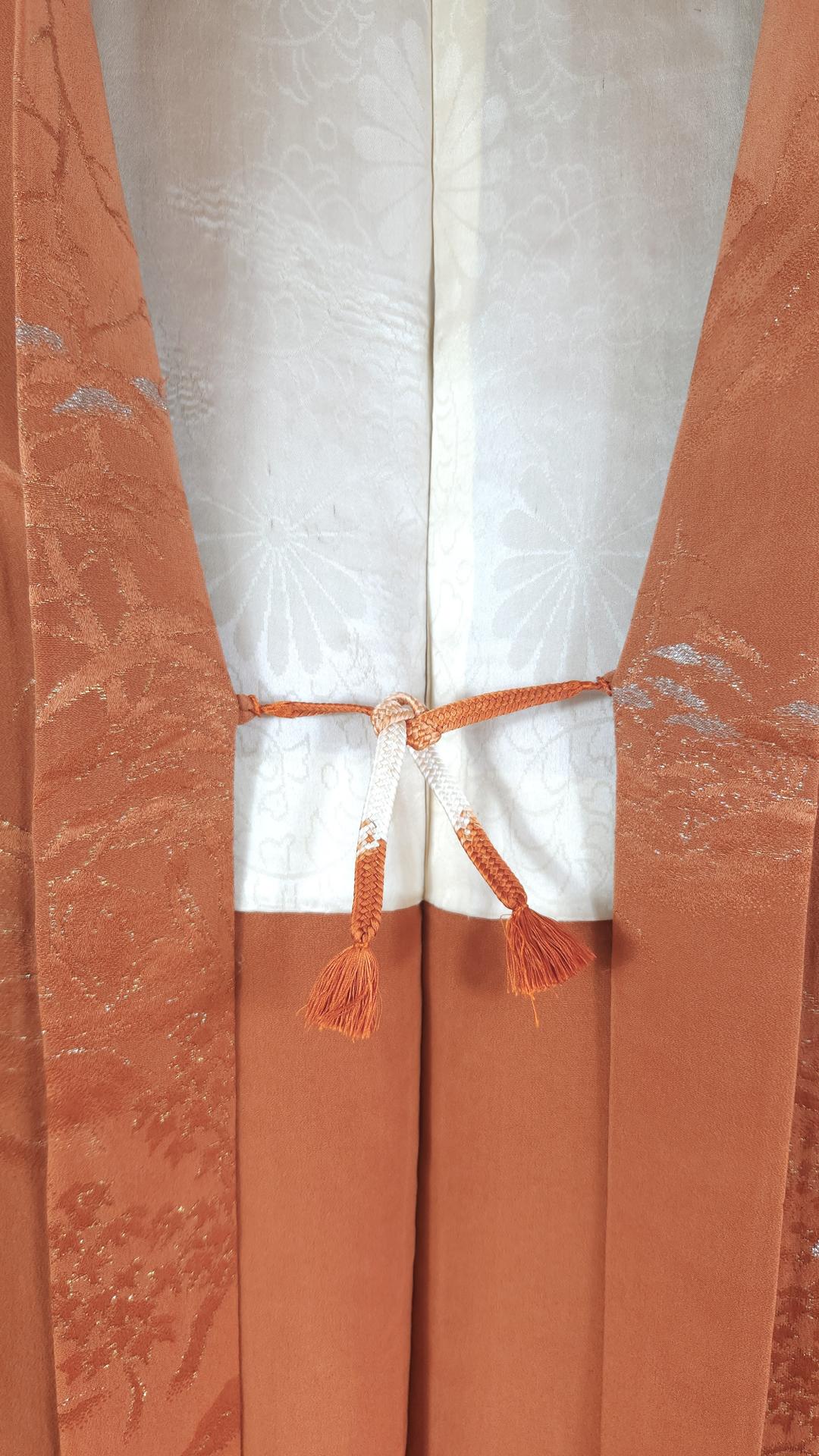 Orange Haori with silver landscape motifs
