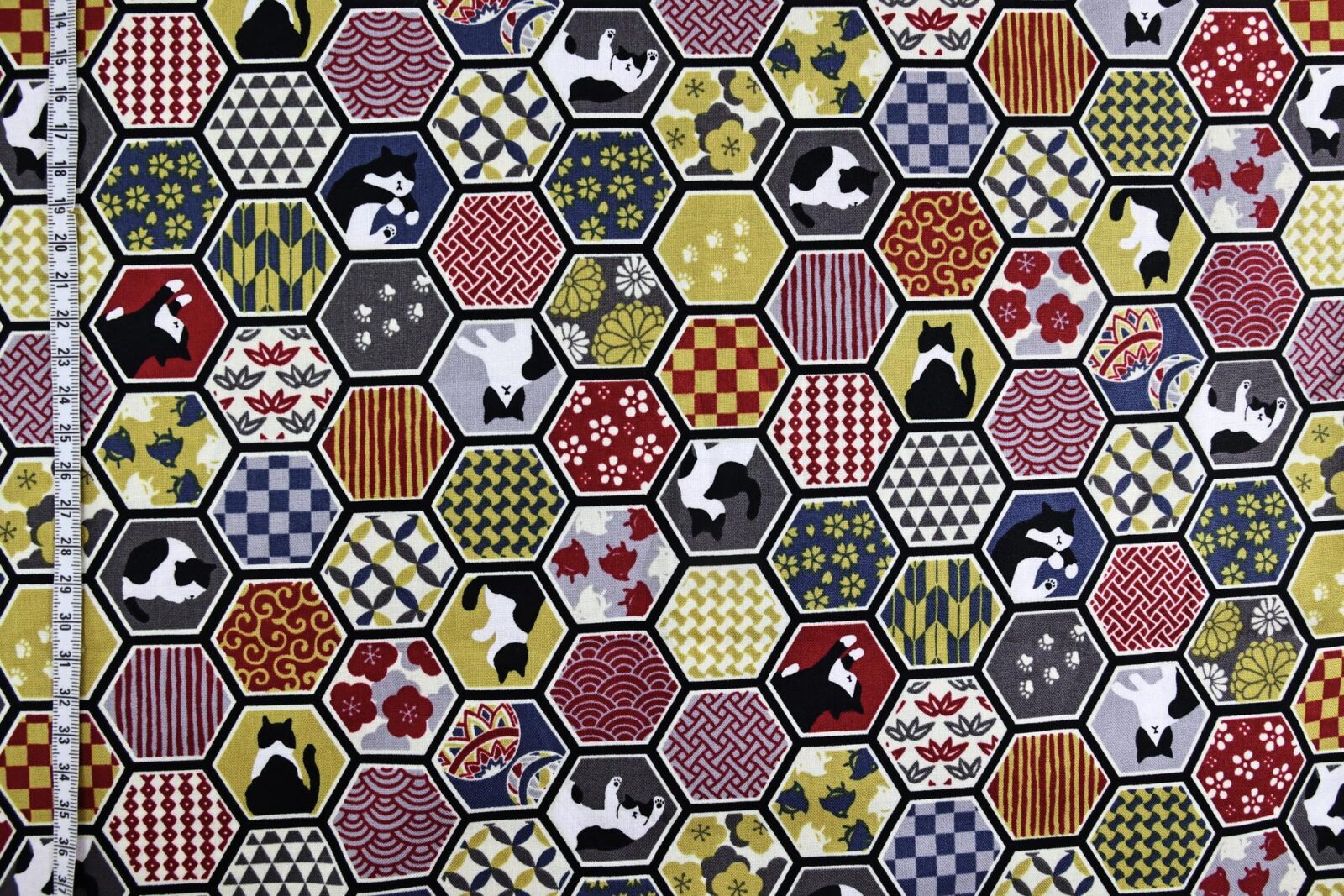Japanese fabric cats and red geometric patterns