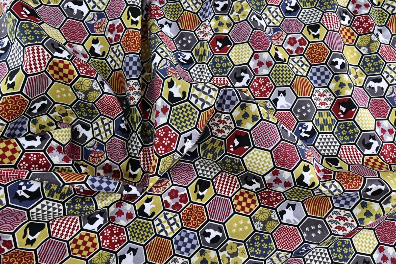 Japanese fabric cats and red geometric patterns