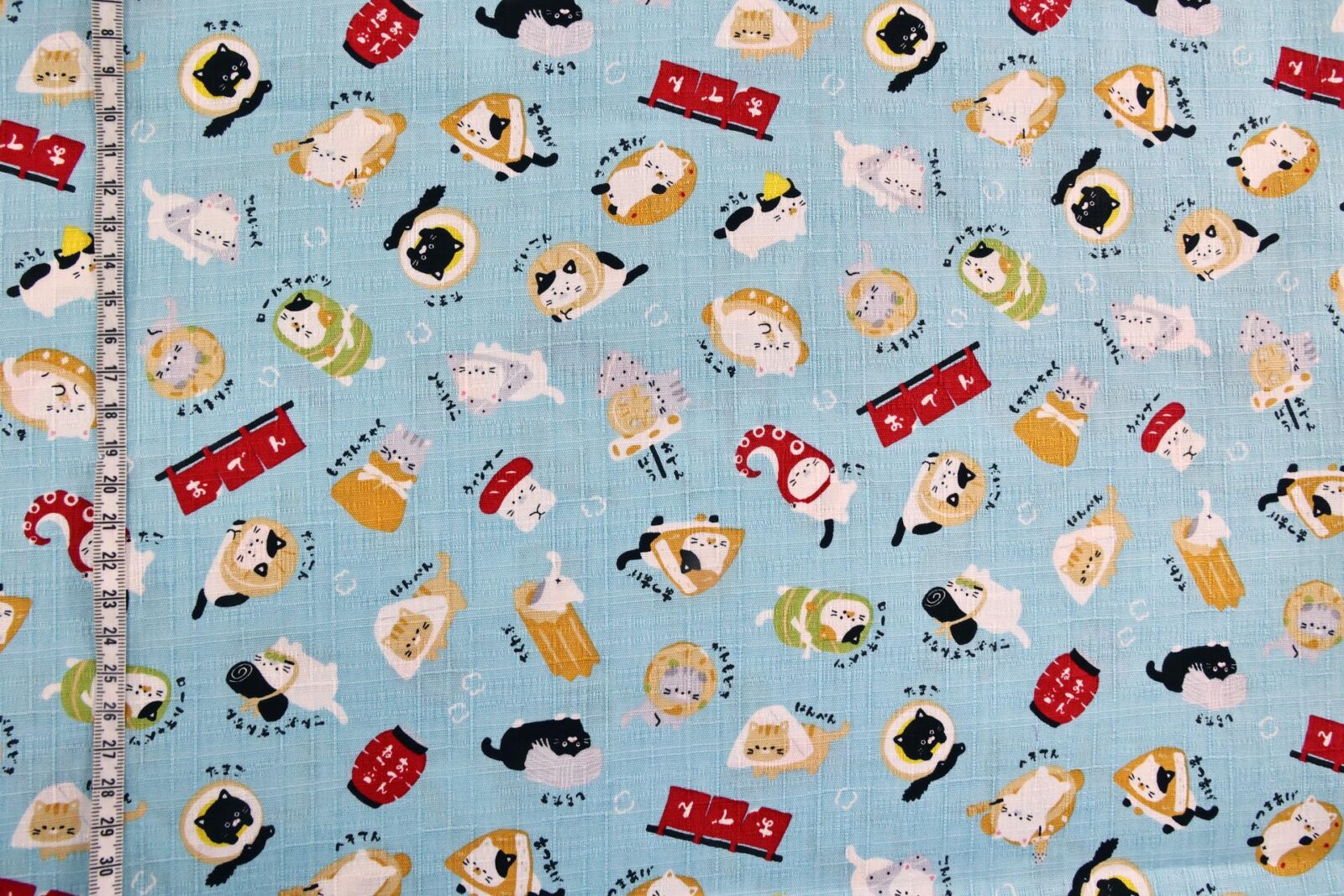 Japanese kawaii Oden Neko fabric blue background