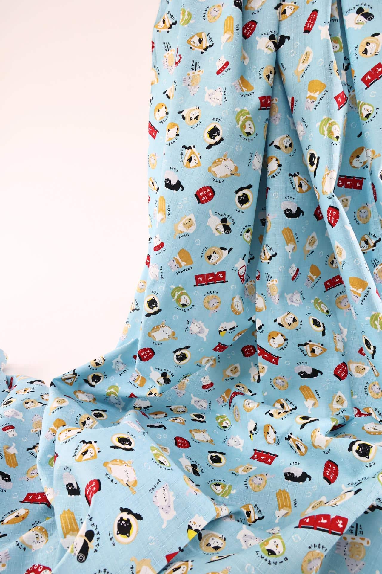 Japanese kawaii Oden Neko fabric blue background
