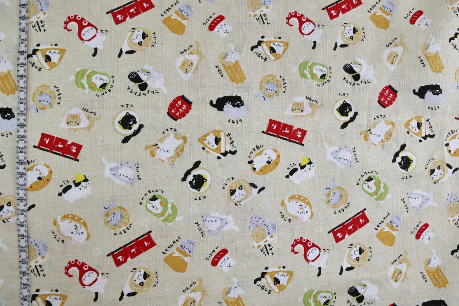 Japanese kawaii Oden Neko fabric cream background