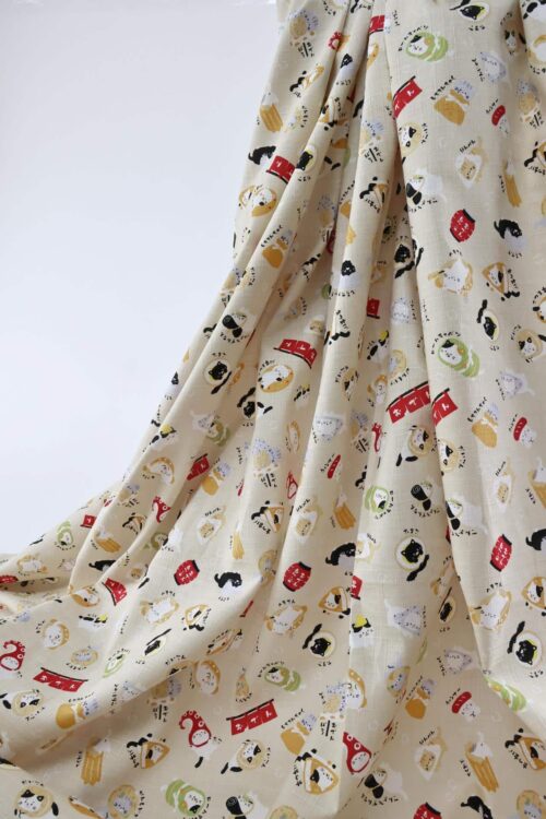 Japanese kawaii Oden Neko fabric cream background