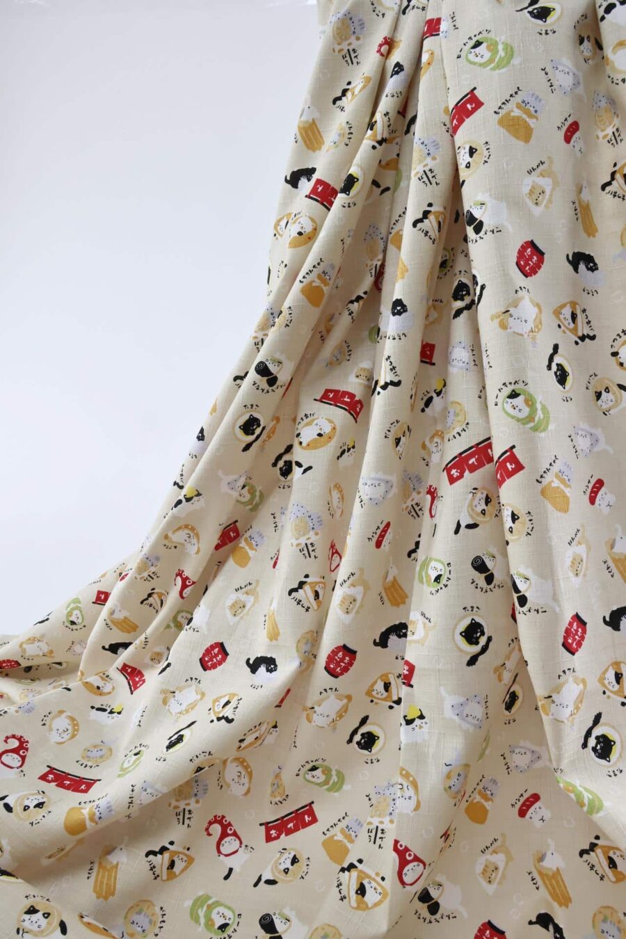 Japanese kawaii Oden Neko fabric cream background