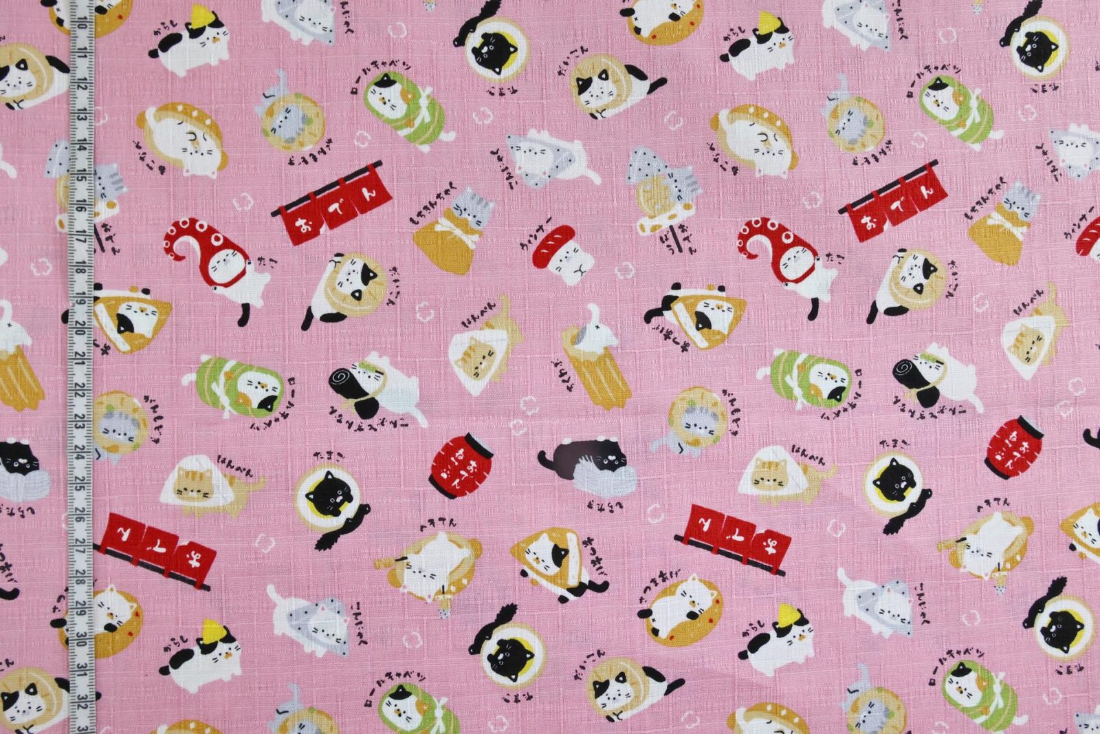Japanese kawaii Oden Neko fabric pink background