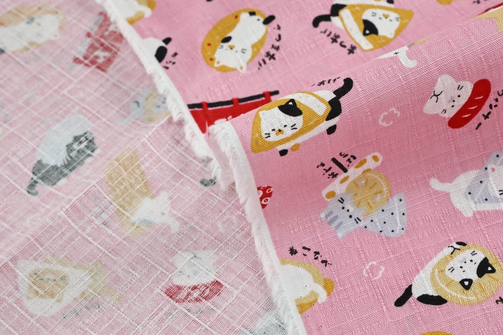 Japanese kawaii Oden Neko fabric pink background