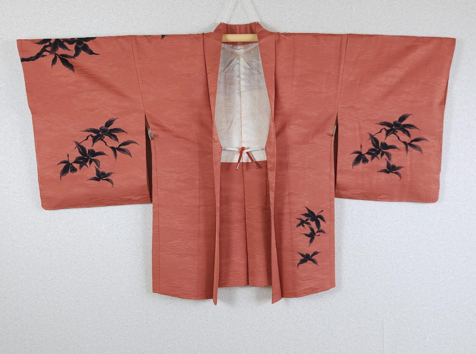 Brick-orange brocade Haori decorated black leaves