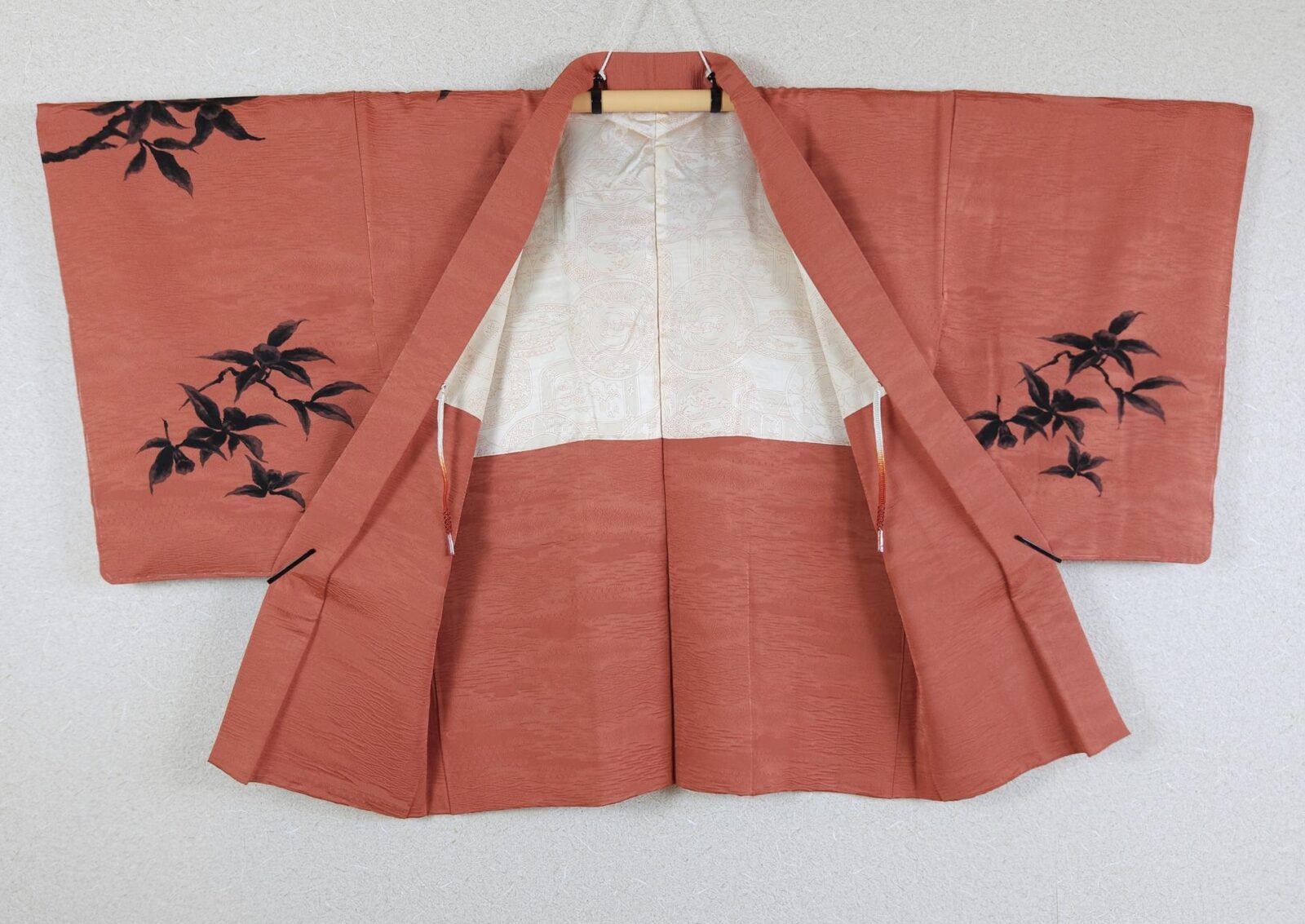 Brick-orange brocade Haori decorated black leaves