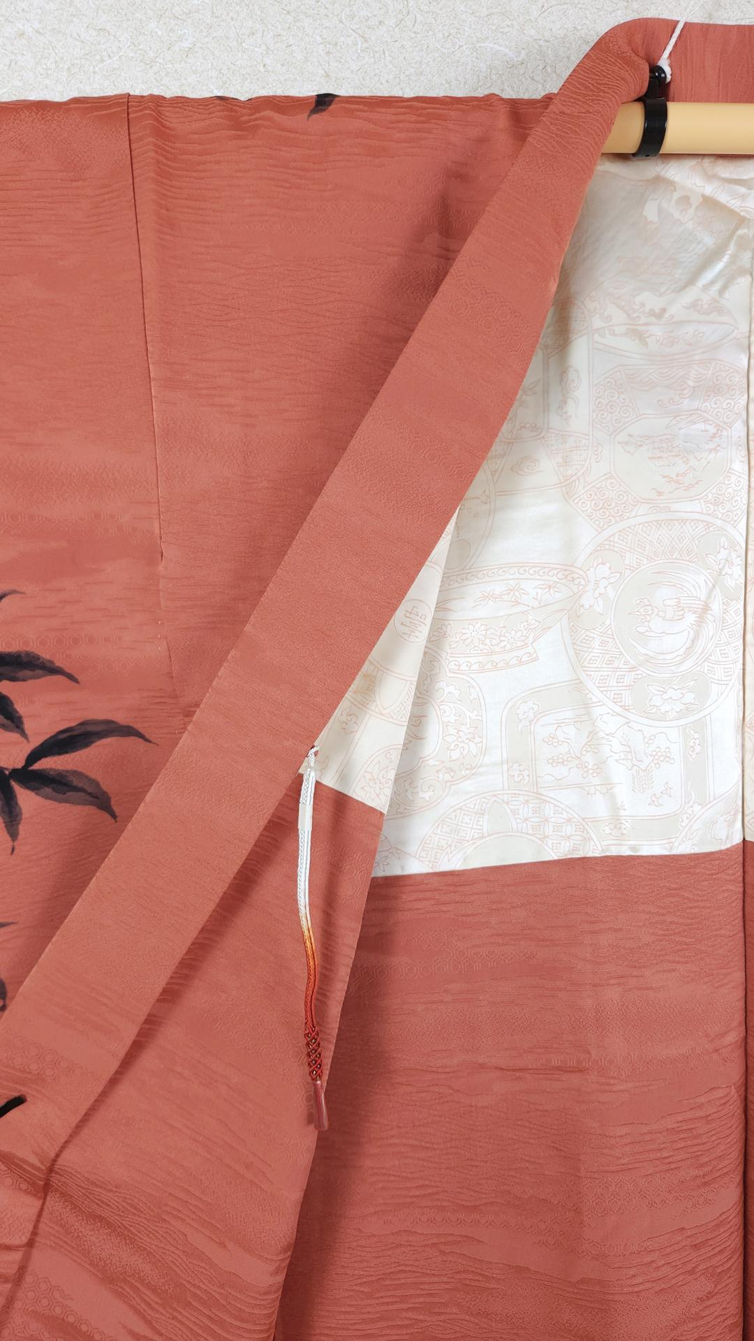 Brick-orange brocade Haori decorated black leaves