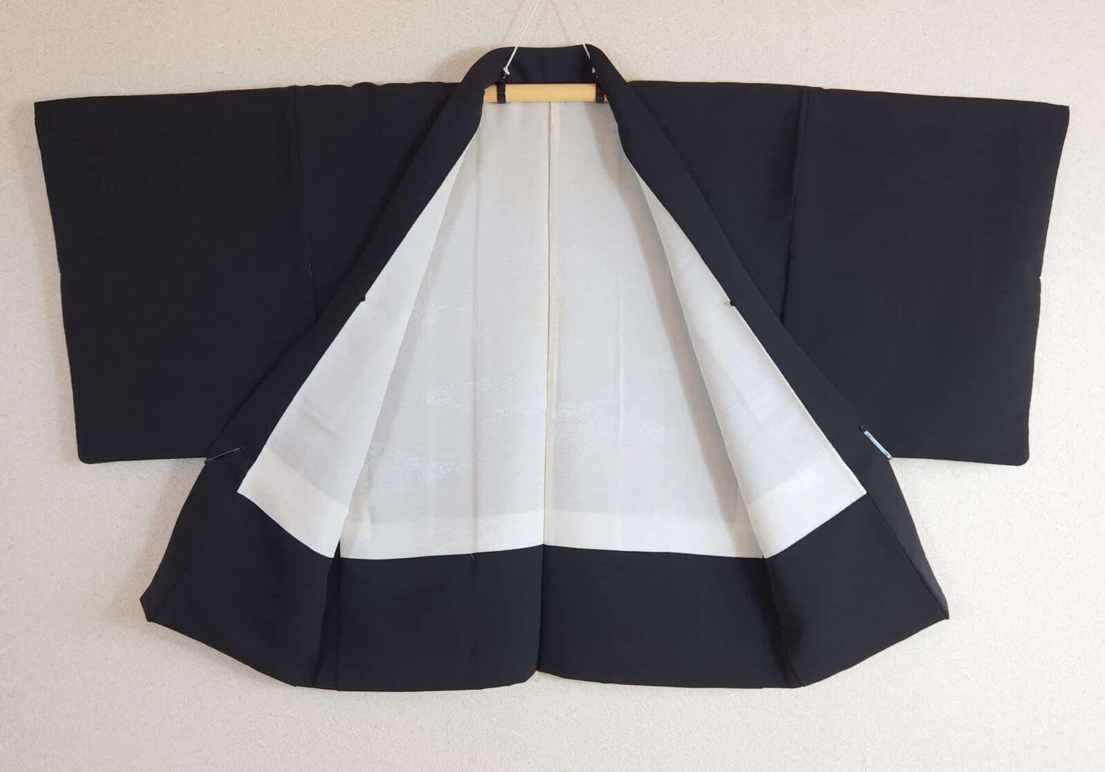 Black Haori with traditional Kuruma motifs