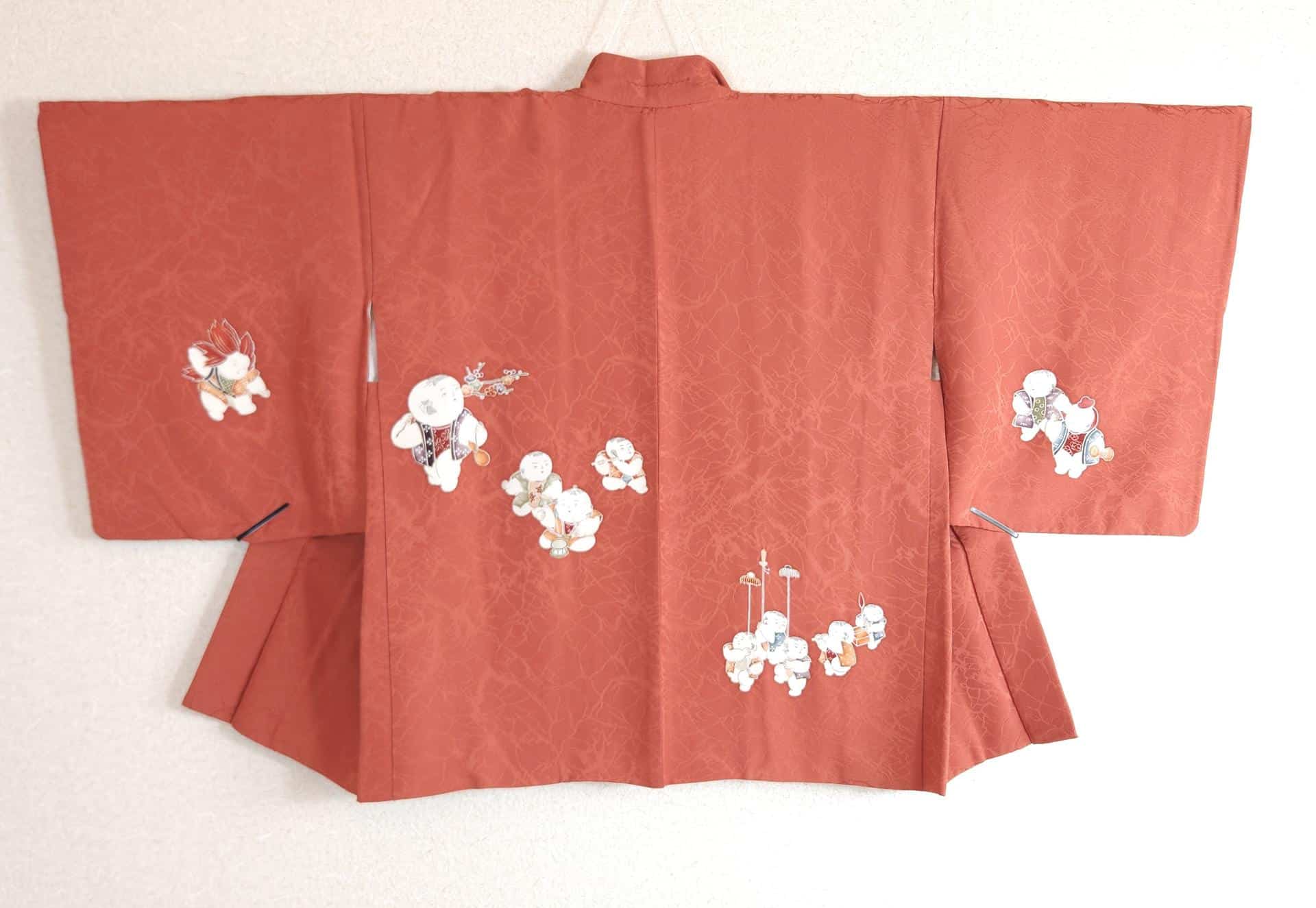 Brick red Yuzen Haori with characters