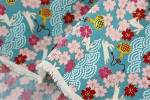 Japanese fabric Usagi and sakura turquoise background