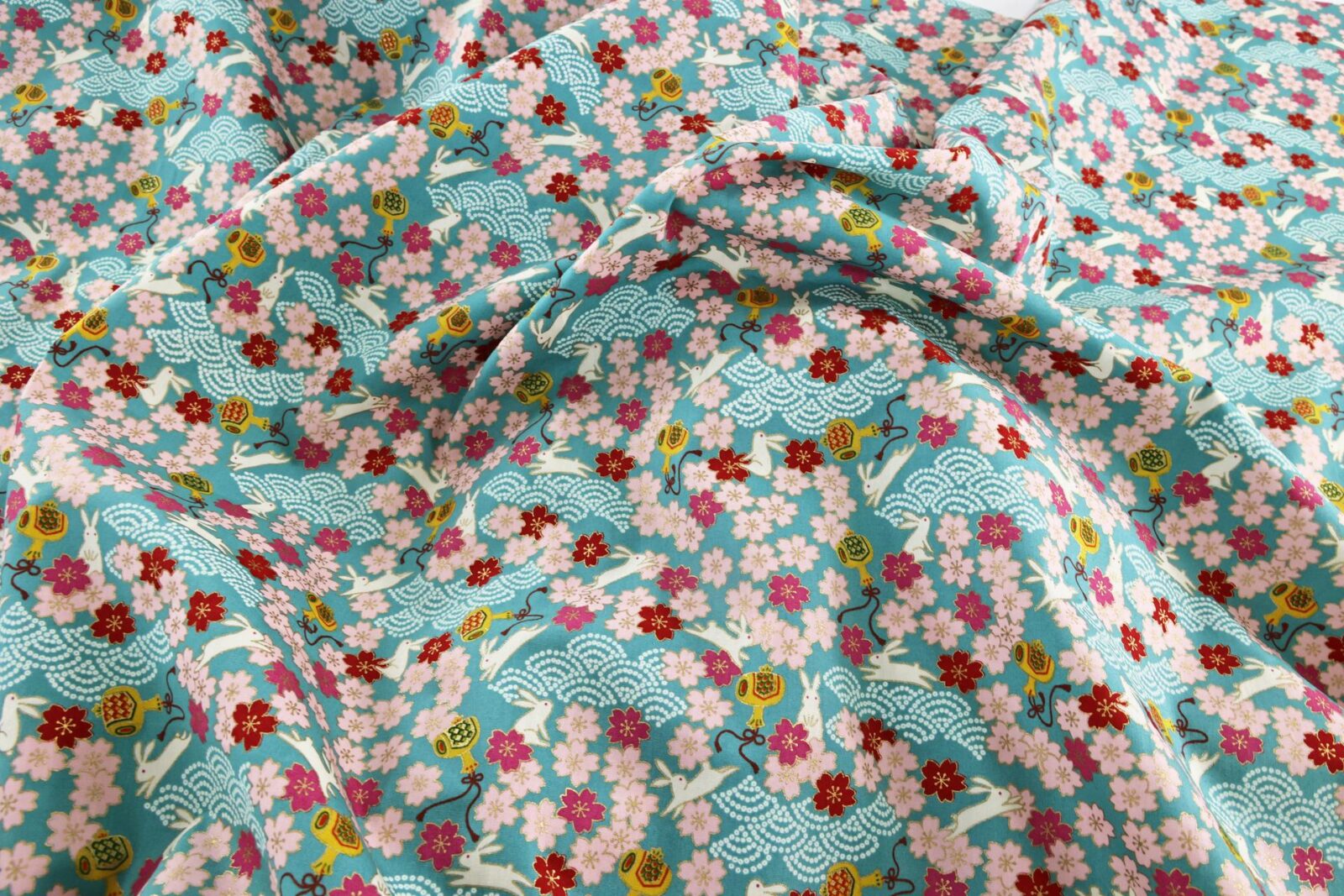 Japanese fabric Usagi and sakura turquoise background