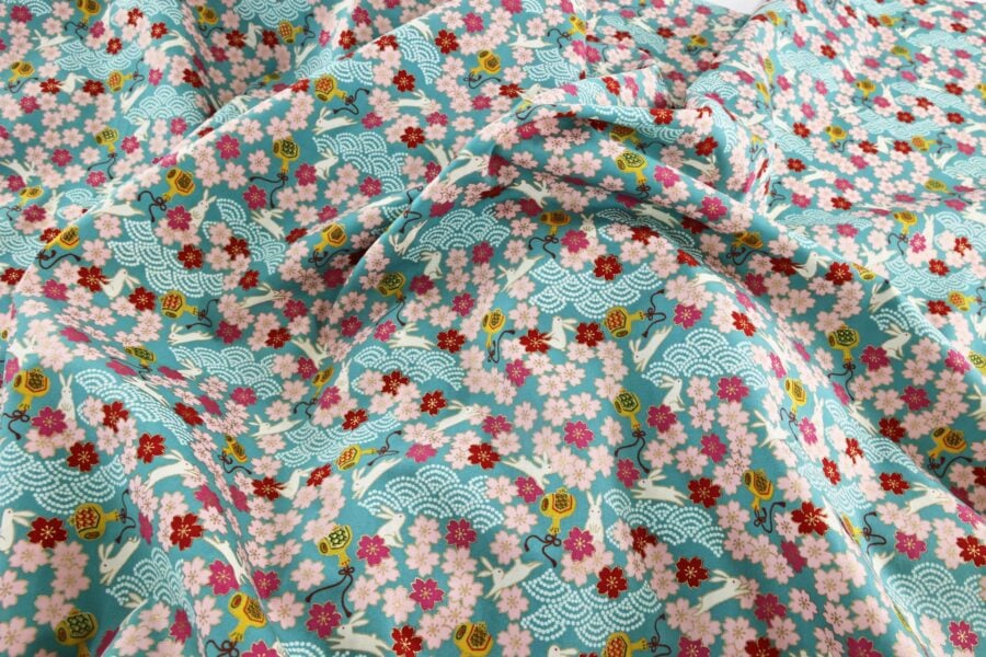 Japanese fabric Usagi and sakura turquoise background