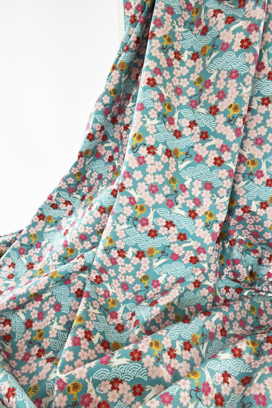 Japanese fabric Usagi and sakura turquoise background