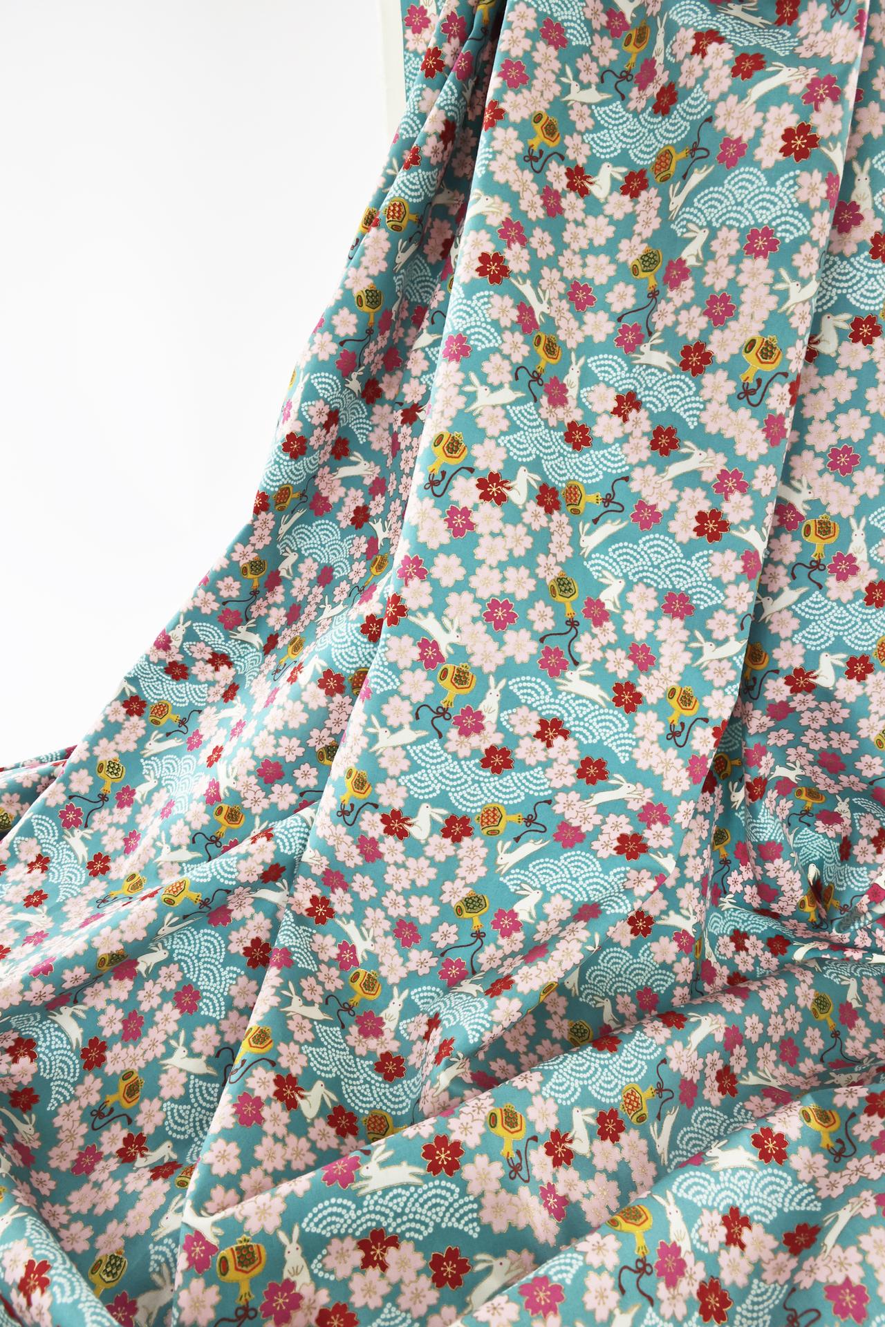 Japanese fabric Usagi and sakura turquoise background