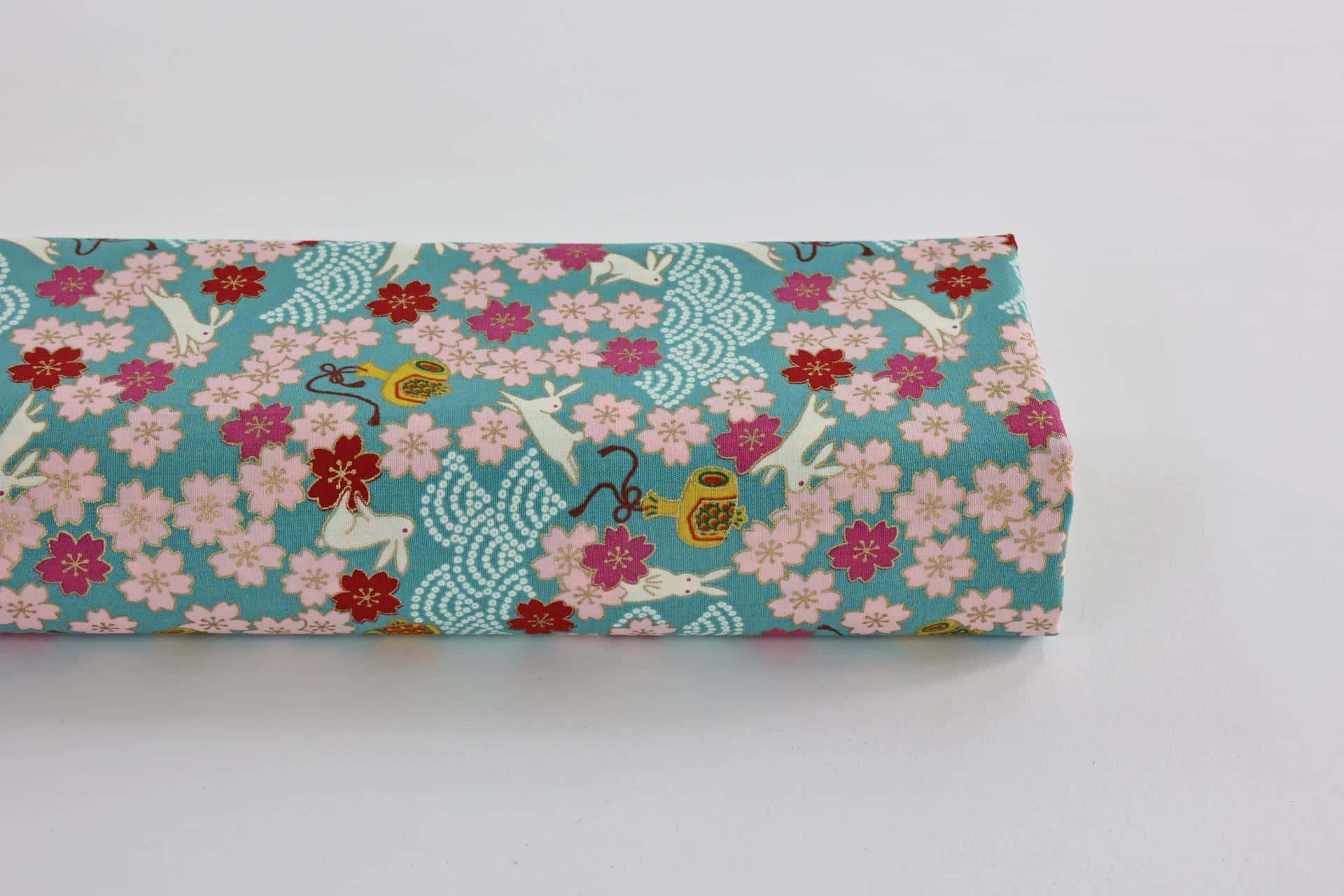 Japanese fabric Usagi and sakura turquoise background