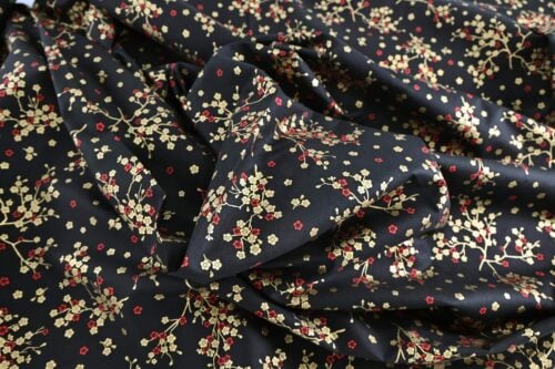 Japanese fabric golden plum blossoms black background