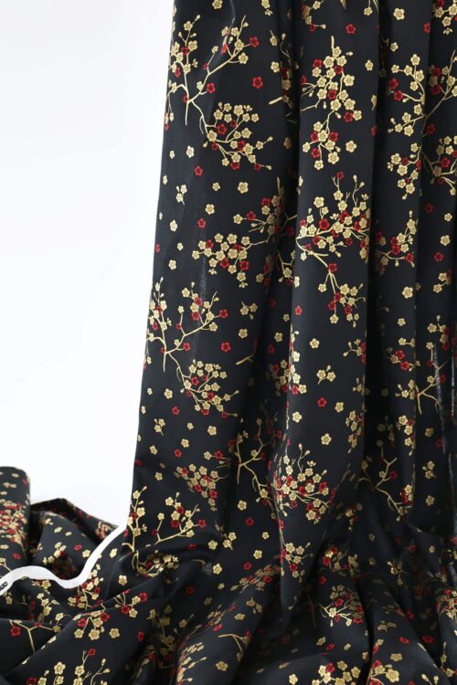 Japanese fabric golden plum blossoms black background