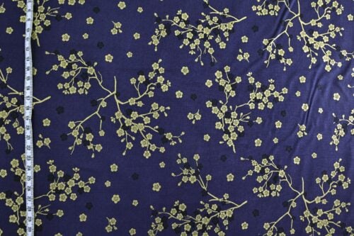 Japanese fabric golden plum blossoms blue background