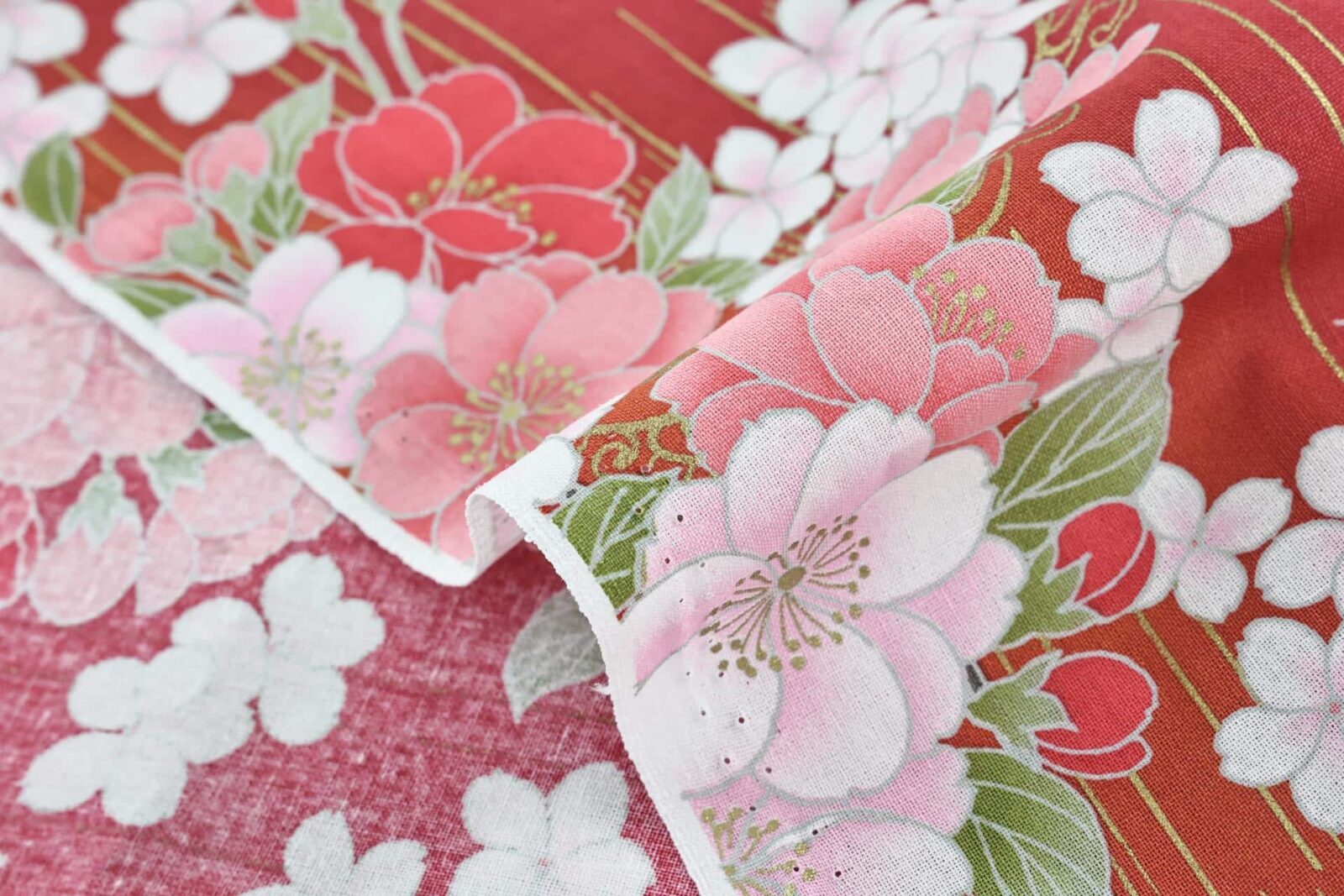 Japanese fabric golden sakura bouquets red background