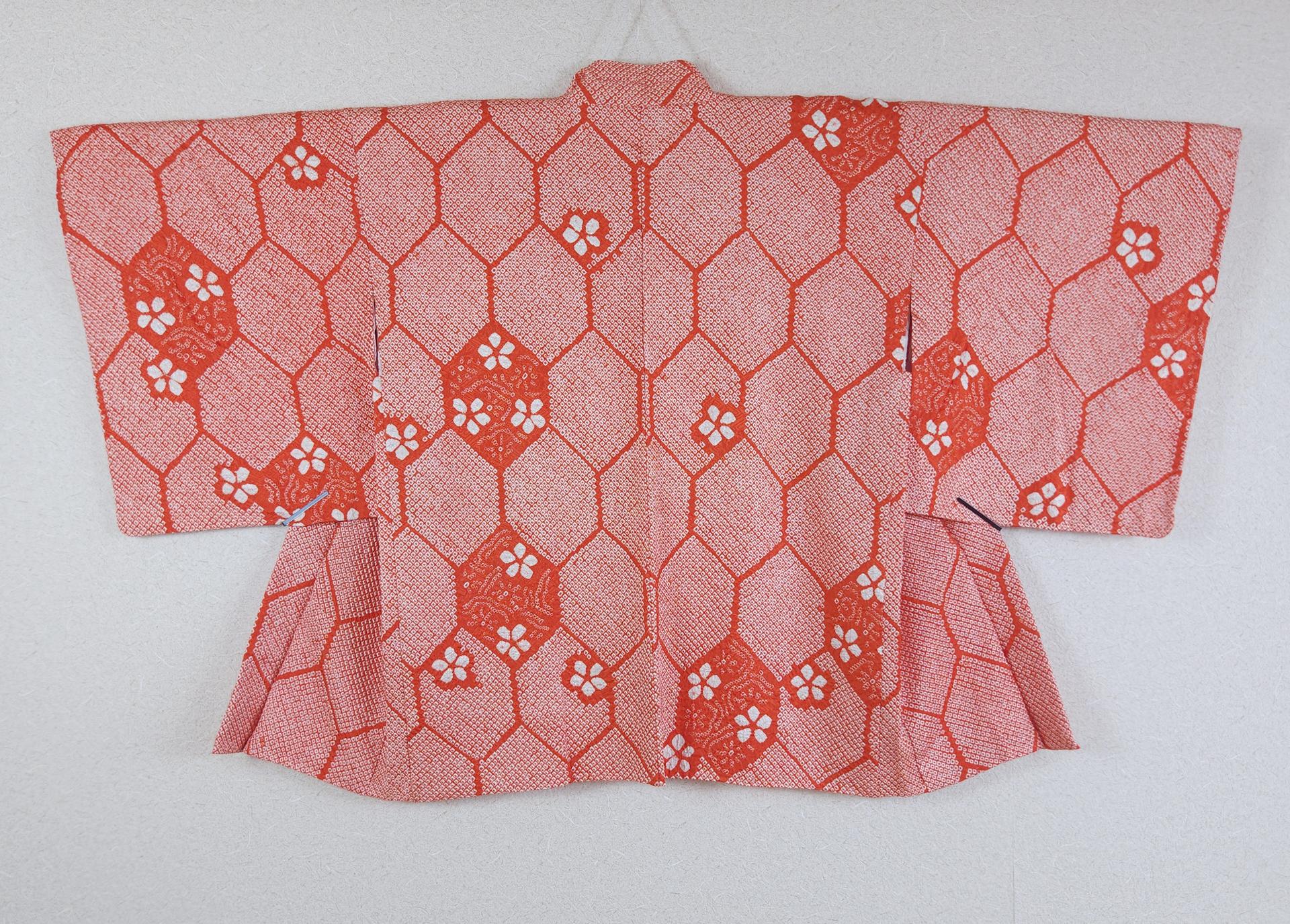Orange-red Haori with Shibori Kikkō patterns