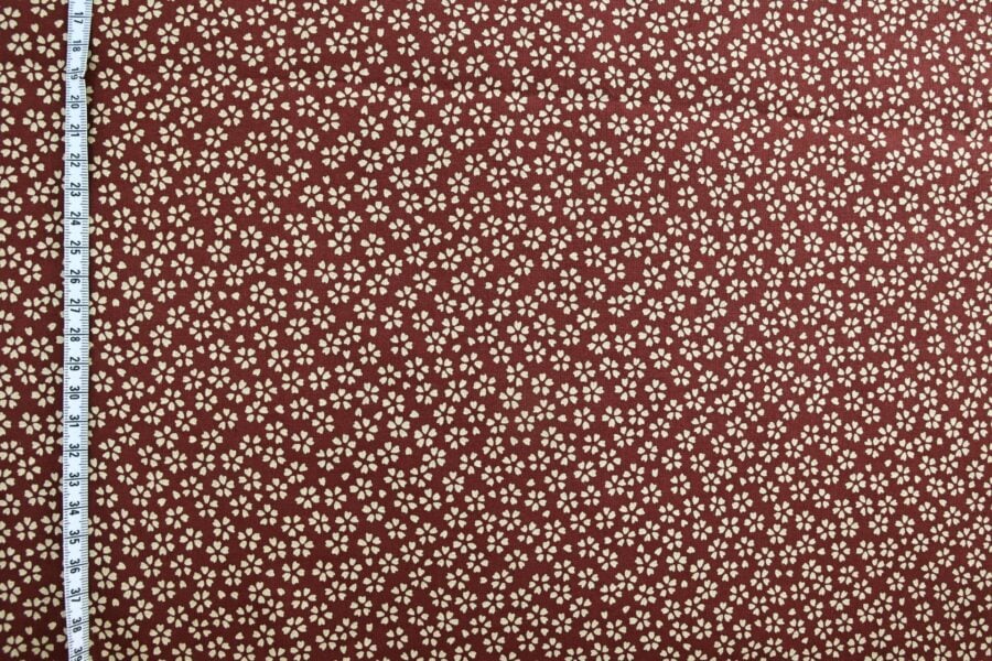 Sevenberry fabric ecru Sakura red background