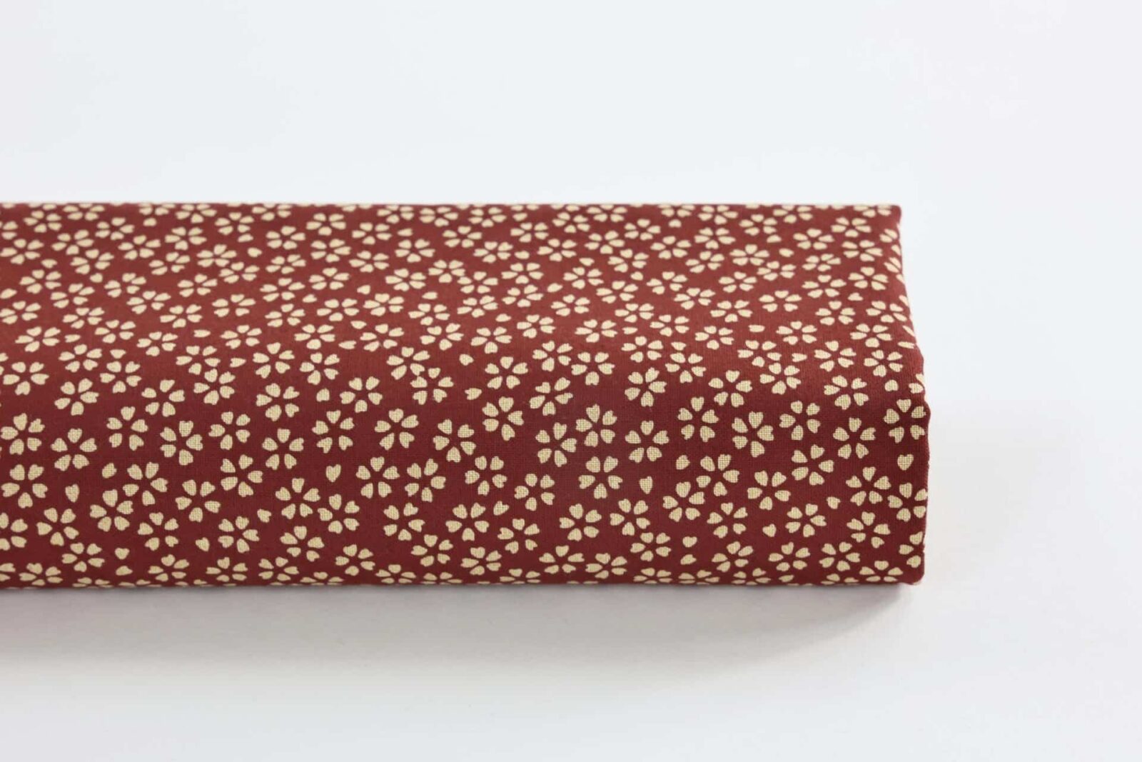 Sevenberry fabric ecru Sakura red background