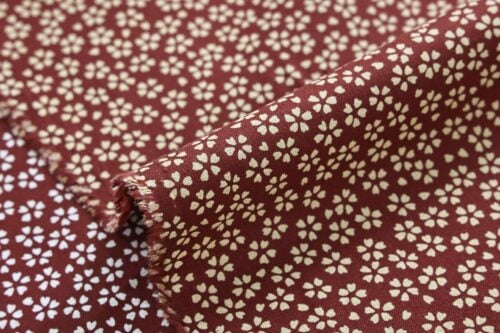 Sevenberry fabric ecru Sakura red background