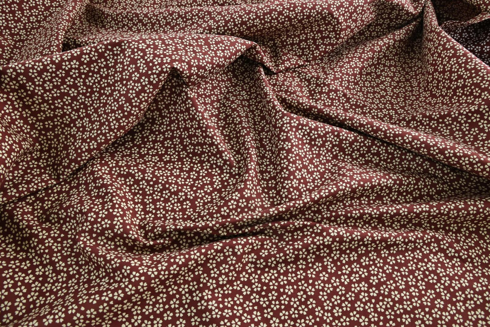 Sevenberry fabric ecru Sakura red background