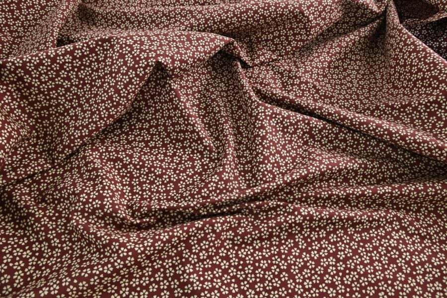 Sevenberry fabric ecru Sakura red background