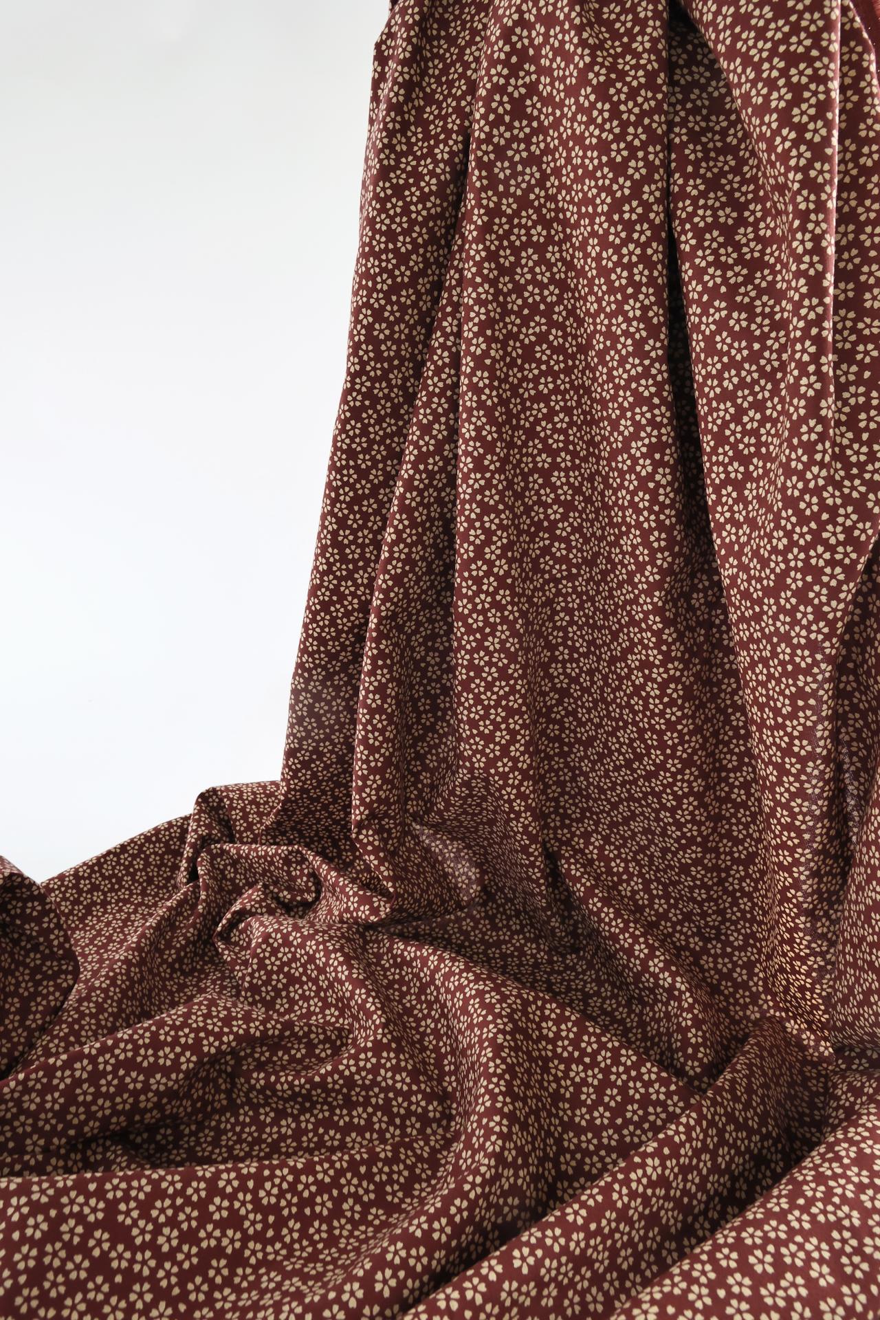 Sevenberry fabric ecru Sakura red background