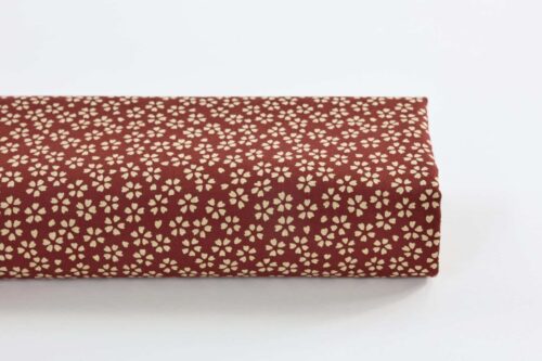 Sevenberry fabric ecru Sakura red background