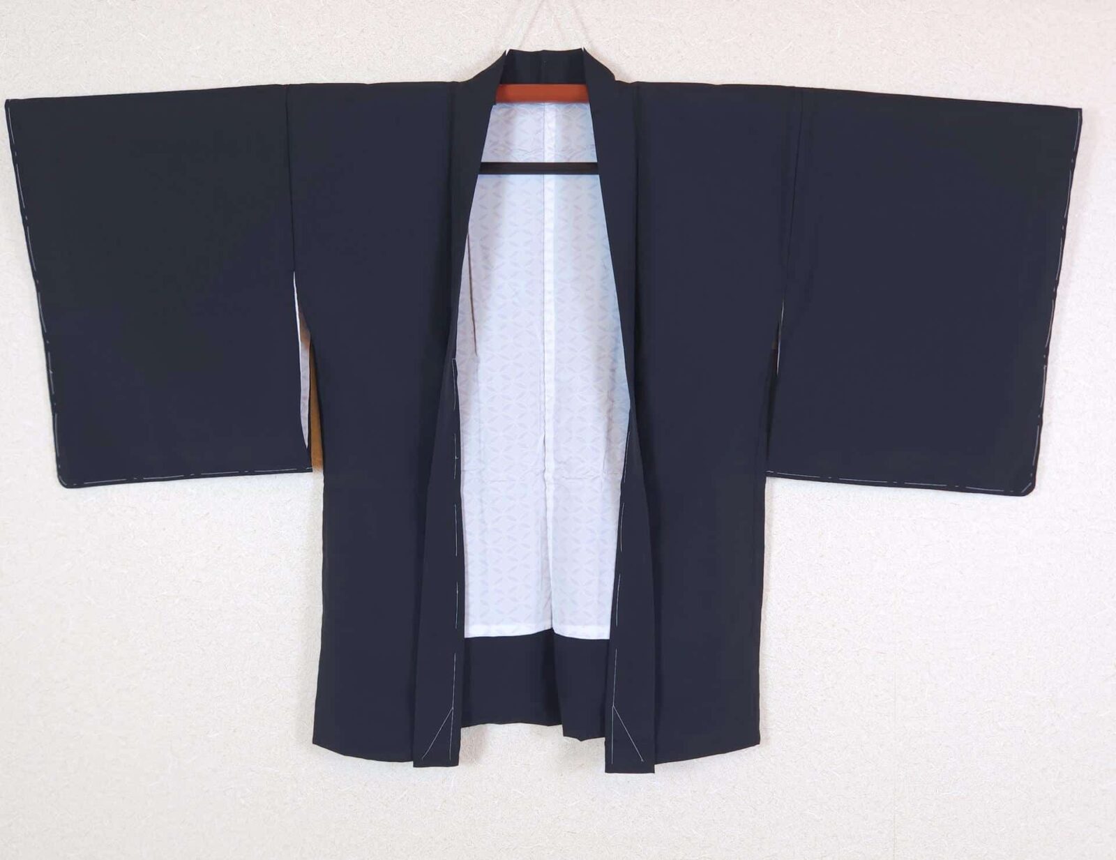 Black Haori with bright red-orange flowers