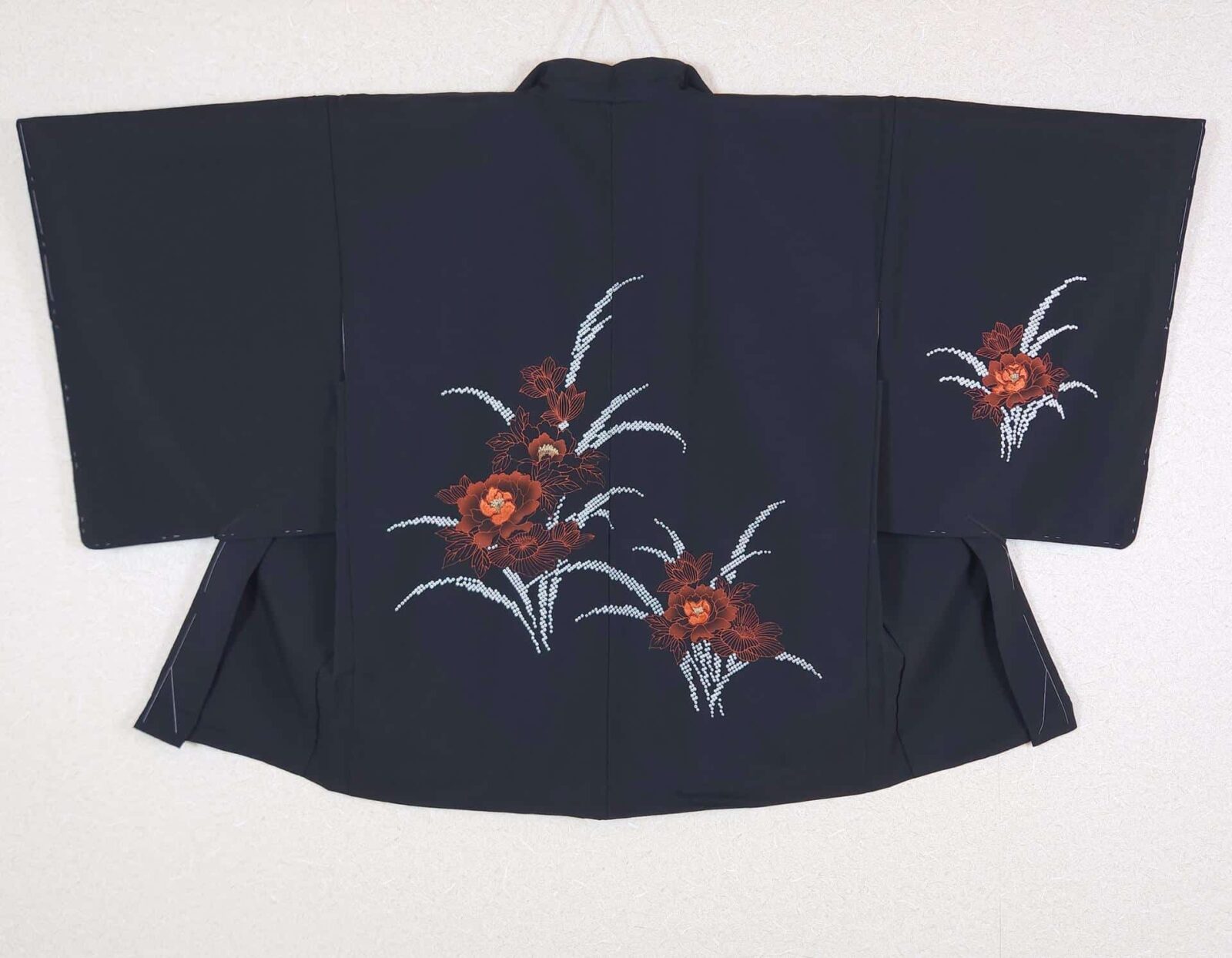 Black Haori with bright red-orange flowers