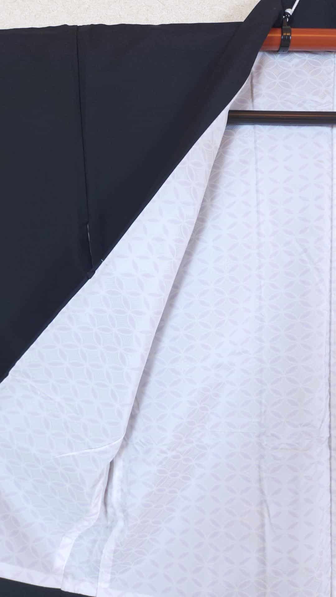 Black Haori with bright red-orange flowers