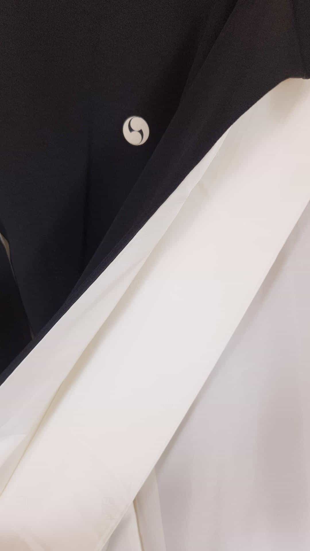 Black Kuro Tomesode with golden poetic motifs